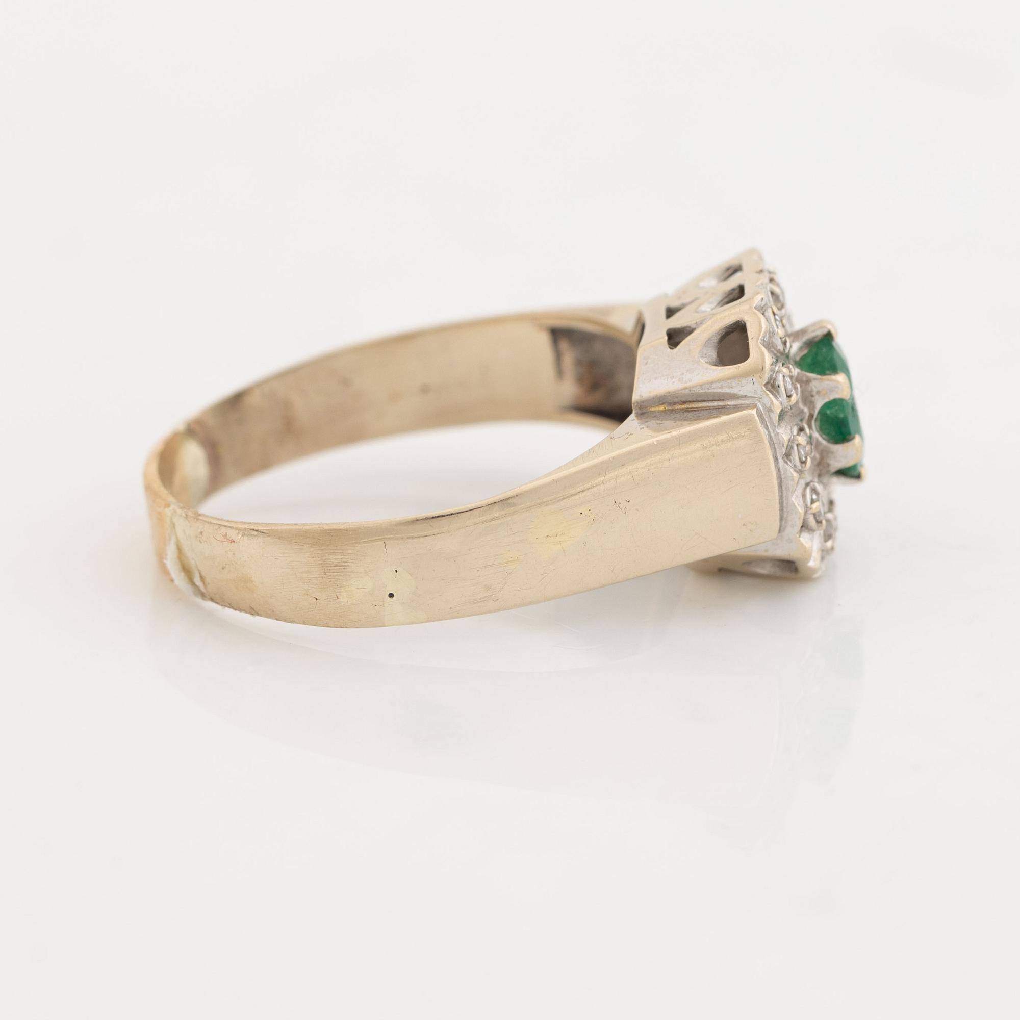 Emerald and diamond ring.