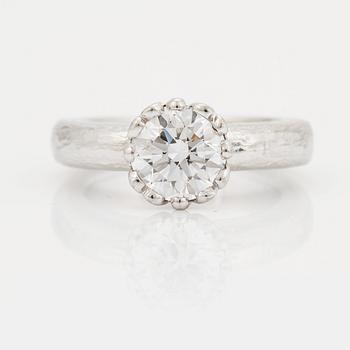 A SOLITAIRE RING.