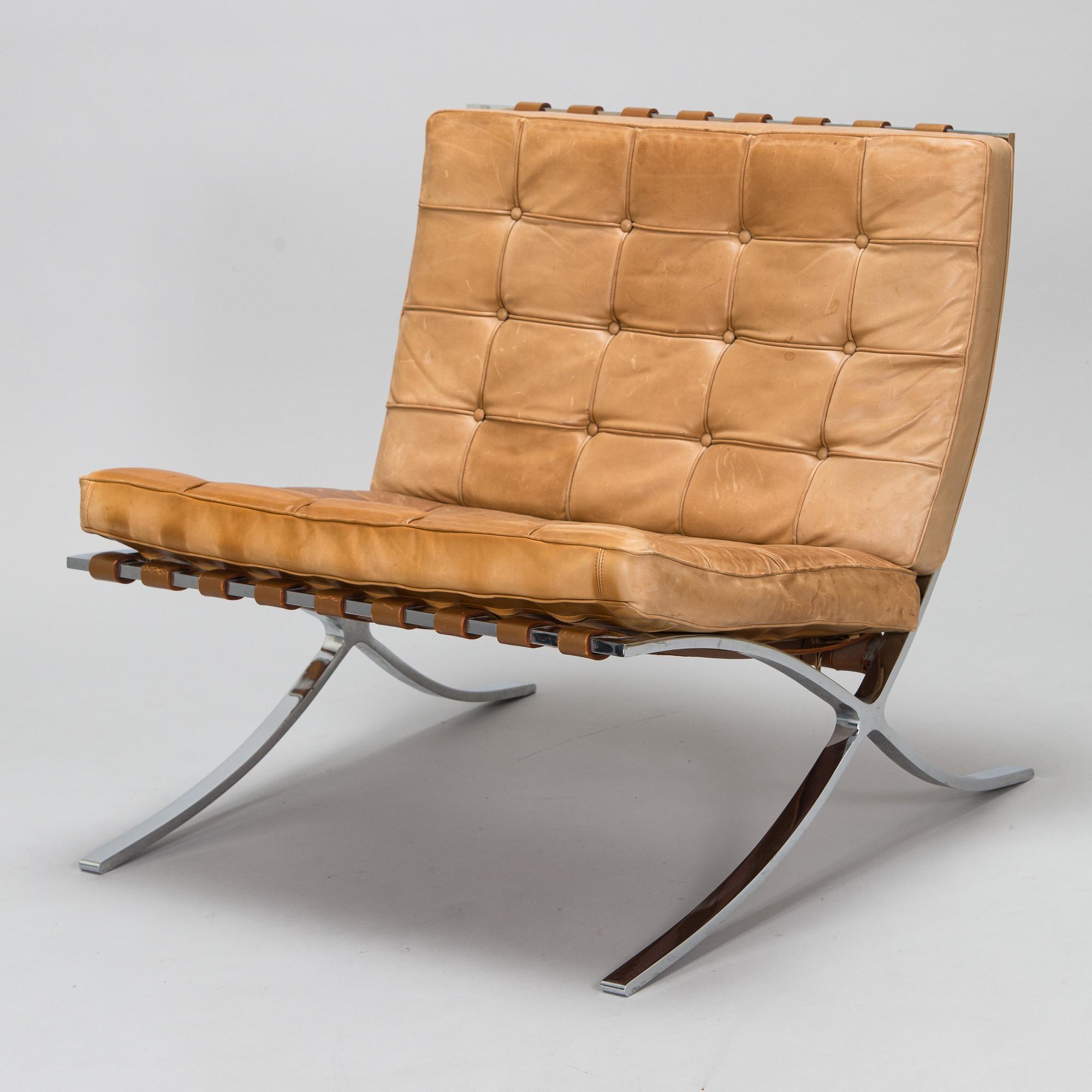 A Ludwig Mies van der Rohe "Barcelona" chair.