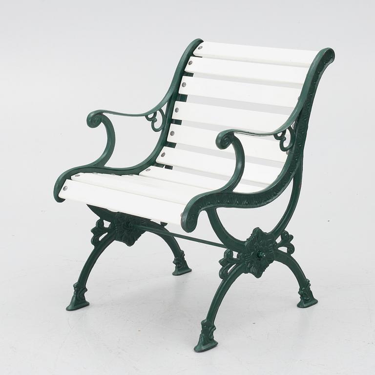 Garden bench, armchair and table, 20th century.