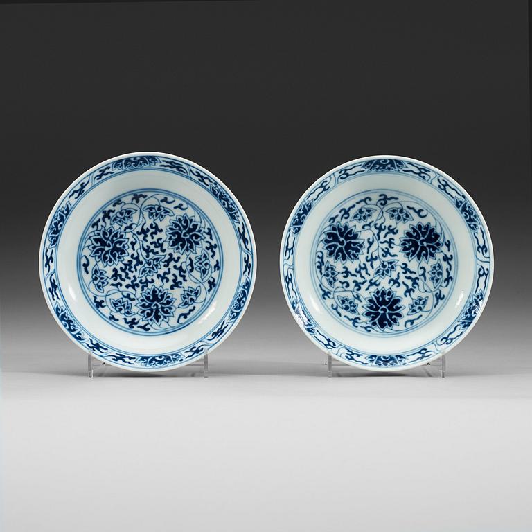 A pair of blue and white lotus dishes, Qing dynasty, Guangxu mark and of period (1874-1908).