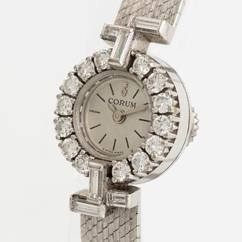 White gold, baguette- and brilliant cut diamond Corum ladies watch.