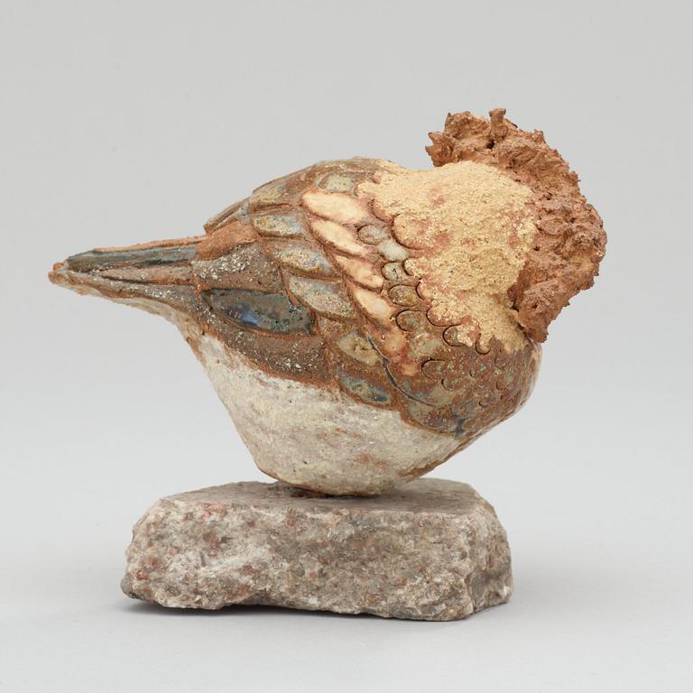 A Tyra Lundgren stoneware figure of a bird.