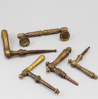 FIVE BRASS DOOR HANDLES, 19th century.