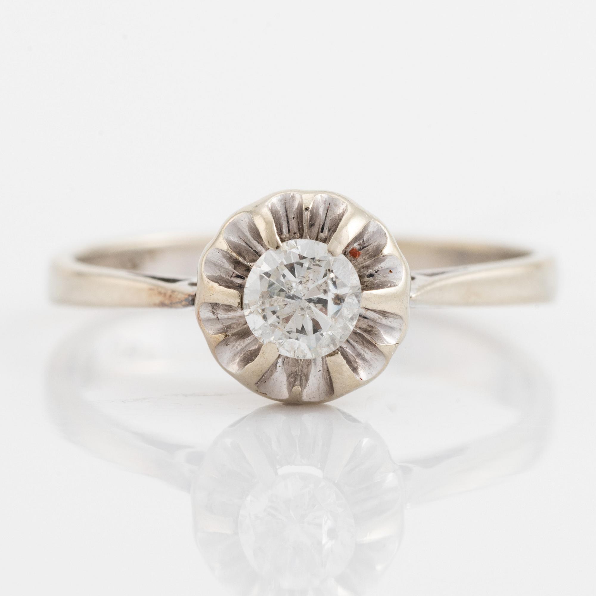 Brilliant cut diamond ring.