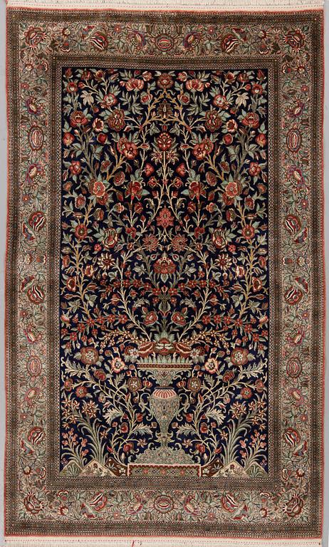 A SILK QUM RUG, ca 222 x 139 cm.