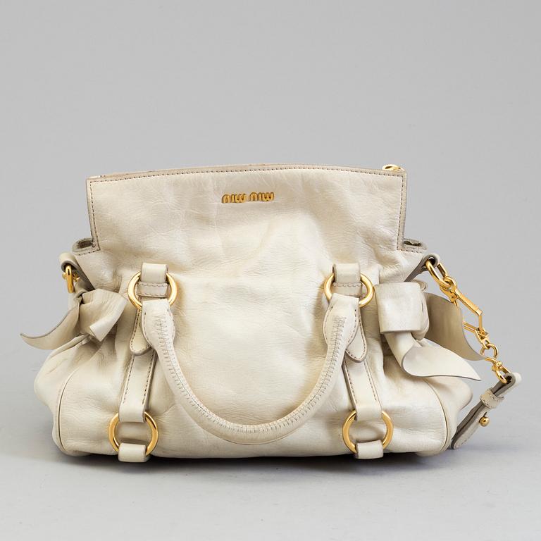 A bag by Miu Miu.