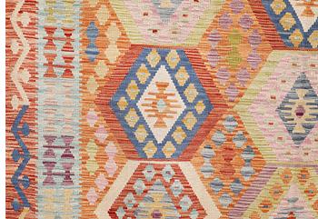 A Kilim carpet, c. 299 x 205 cm.