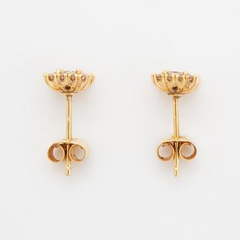Diamond earrings.