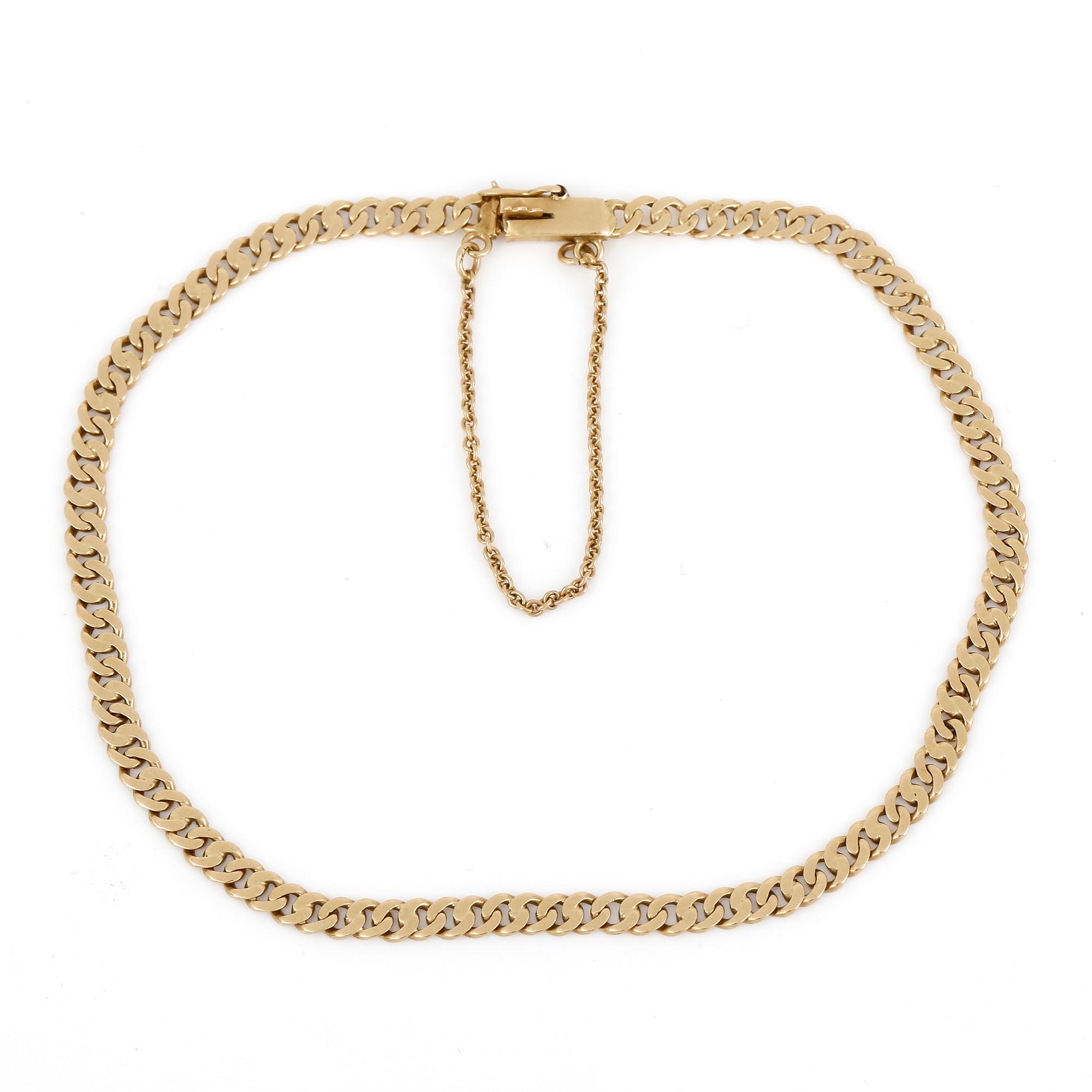 ARMBAND samt RING, 18k respektive 23k guld, vikt ca 3,4g respektive 7,1g.