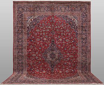 A semi-antique Keshan carpet, signed, 449 x 317 cm.