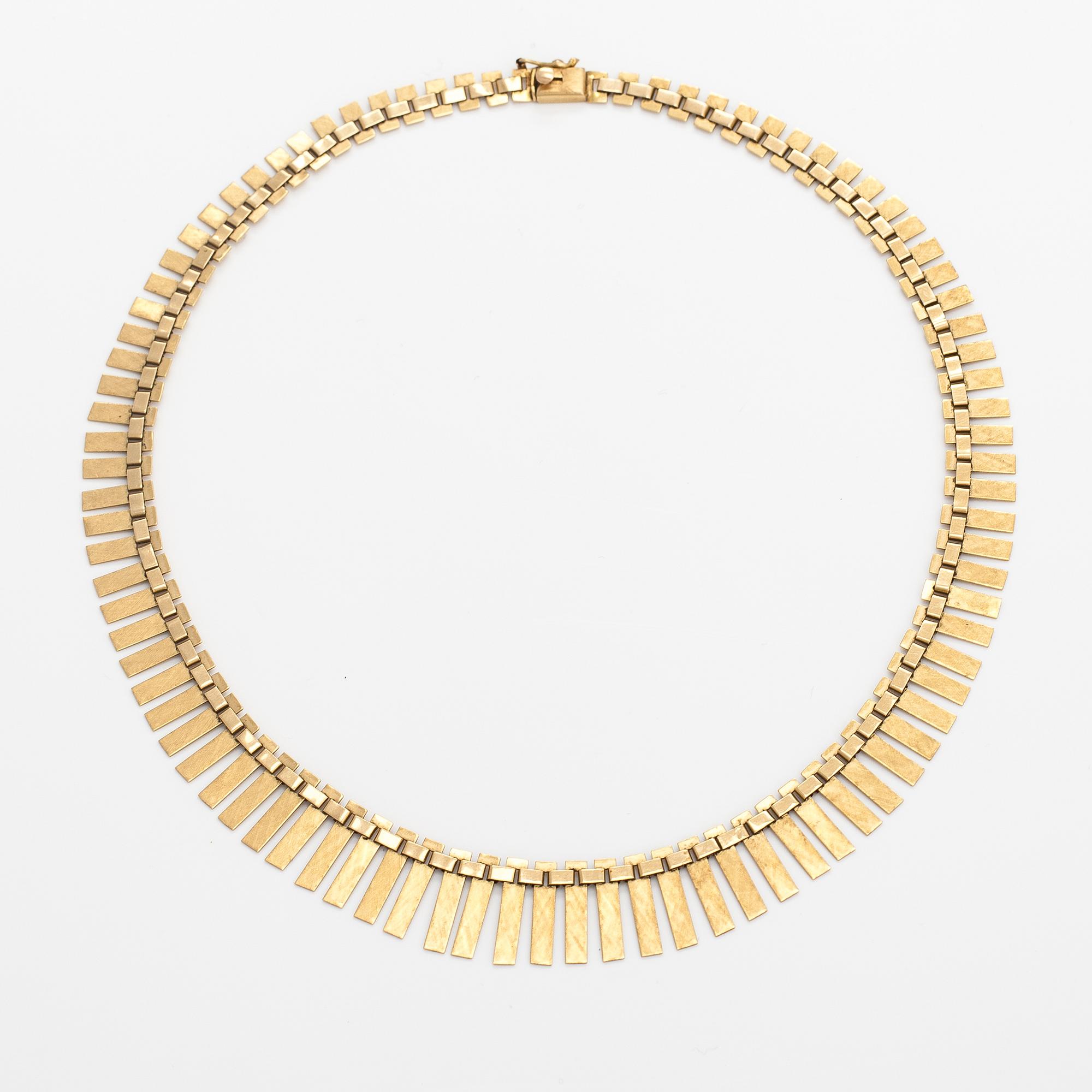 A 14K gold necklace. Import marked Koruteollisuus Tillander, Helsinki 1965.
