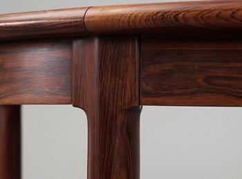 A Niels Ole Møller palisander dining table and nine chairs, J.L. Møller, Denmark 1950's-60's.