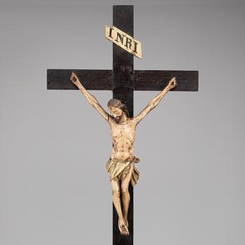 A painted wood crucifix, 18th/19th century.