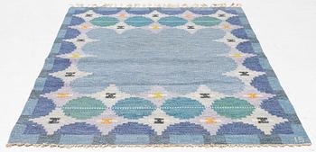 Ingegerd Silow, a flat weave rug, signed IS, circa 203 x 133 cm.