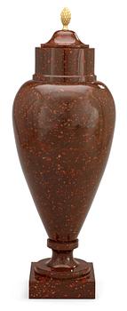 729. A Swedish early 19th century porphyry urn.