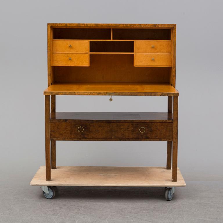 a mid 20th century birch bureau from Axel Larson, Bodafors, model number 954.