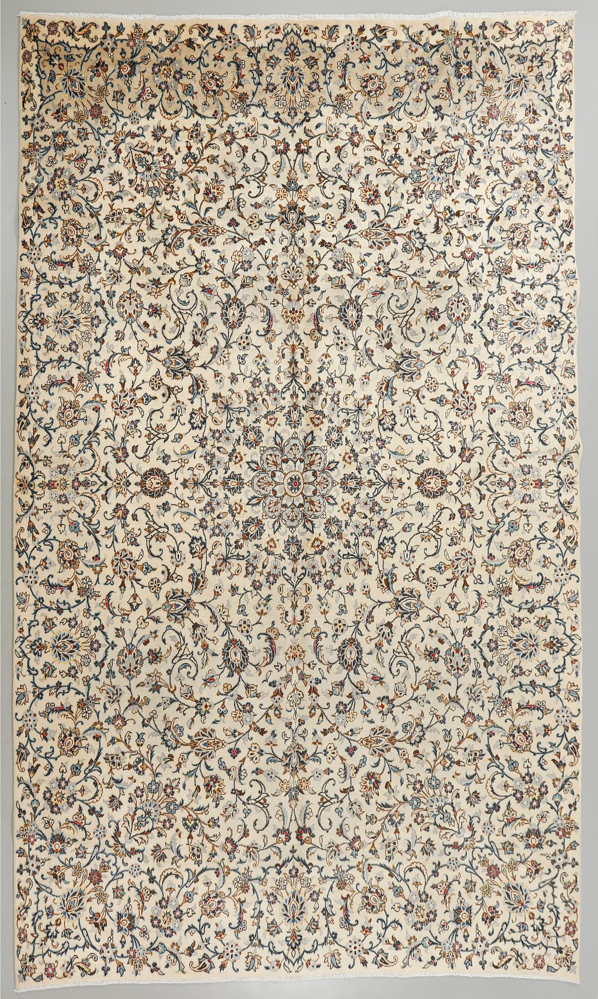 A Keshan rug, 396 x 290 cm.