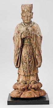 A wooden sculpture of a deity, Ming style.