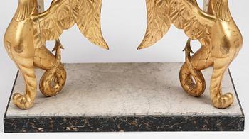 A Swedish Empire gilt wood and white marbel console table.