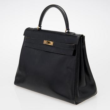 A Black 1970s Kelly 35 Bag.