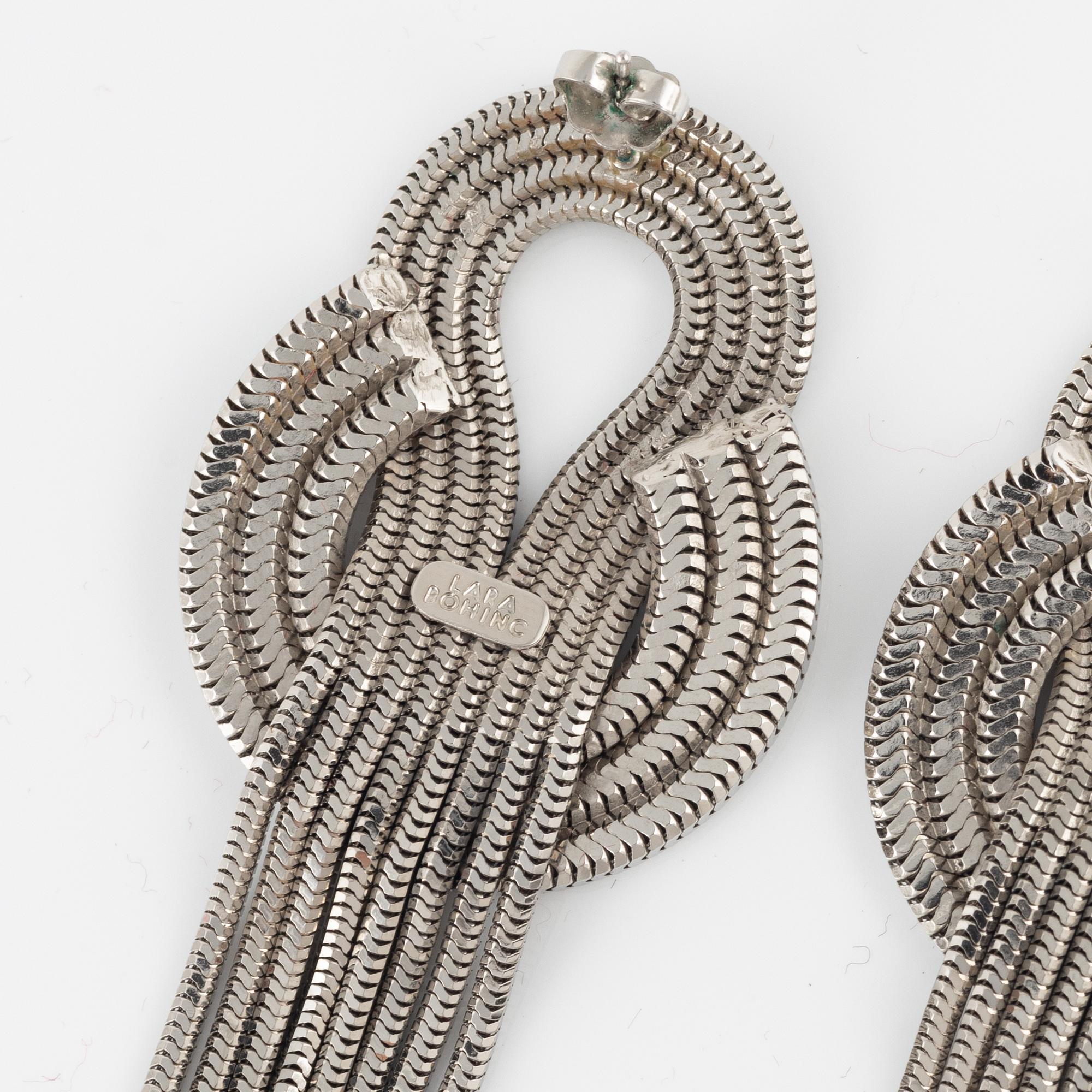 Lara Bohinc a pair of Saturn earrings. Bukowskis