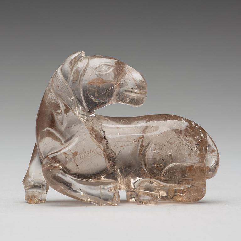 A quartz carving of a reclining horse, China.