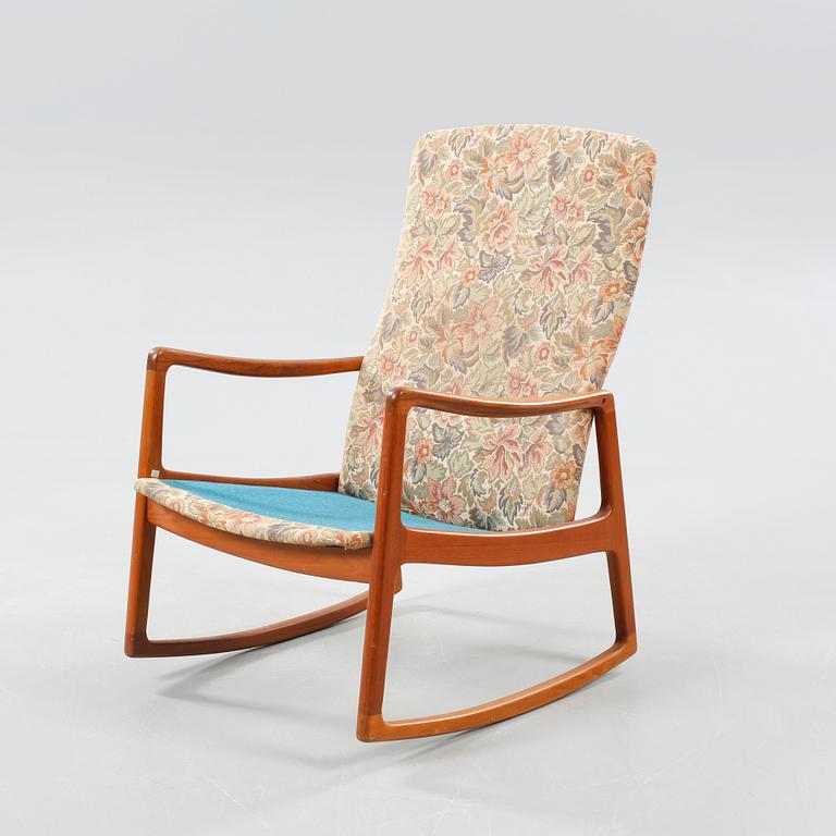 A rocking chair by Ole Wanscher for France & son from Denmark from the second part of the 20th century.