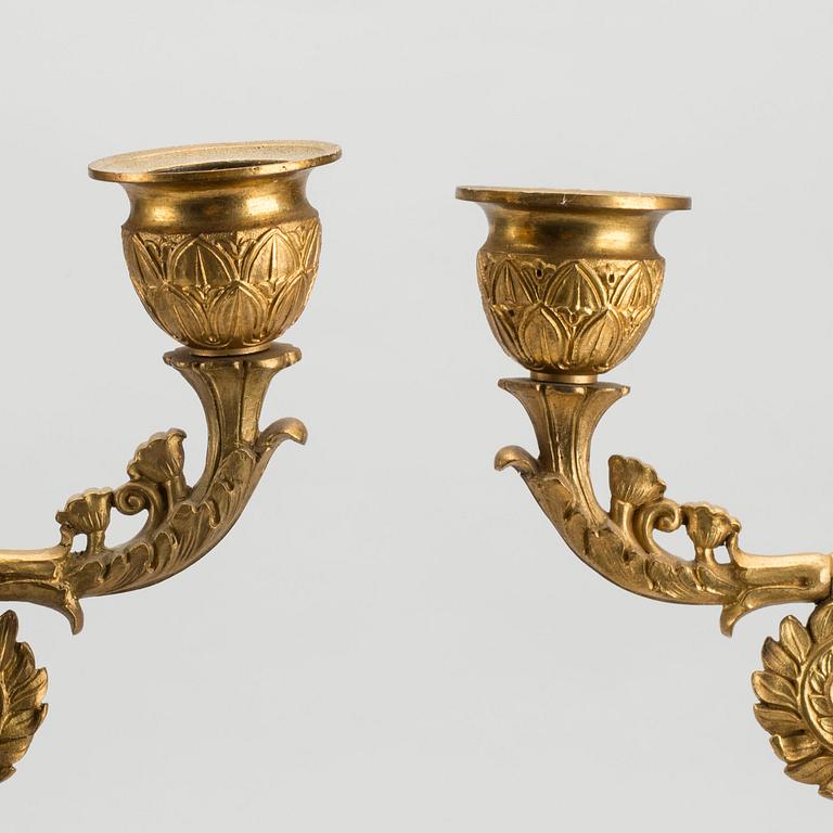 A pair of Empire candelabras.