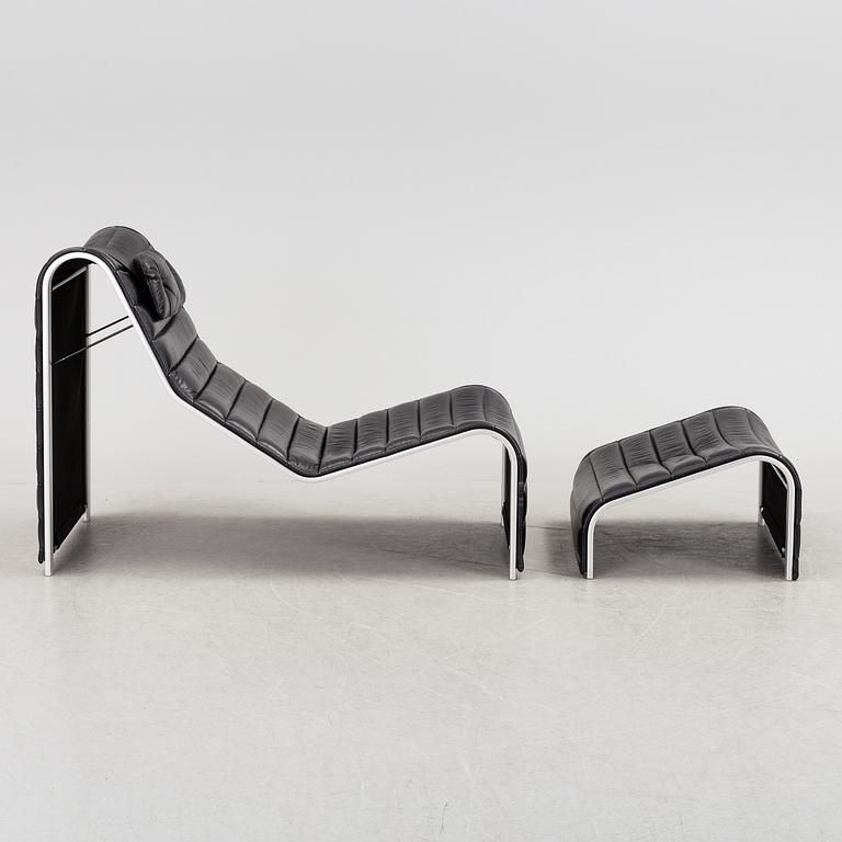 ERIC SIGFRID PERSSON, a leather upholstered lounge chair and foot stool from Möbelkultur AB.