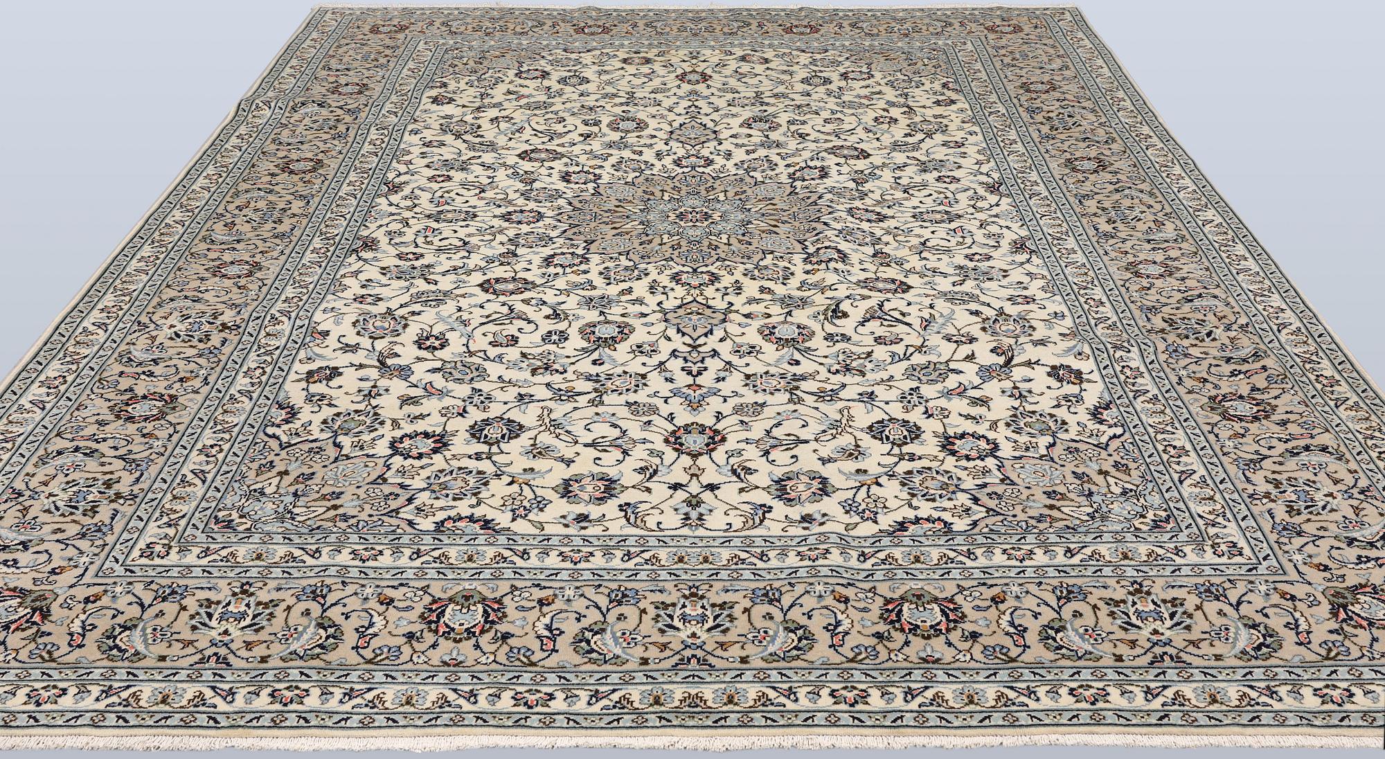 A Keshan carpet, approx. 355 x 250 cm.