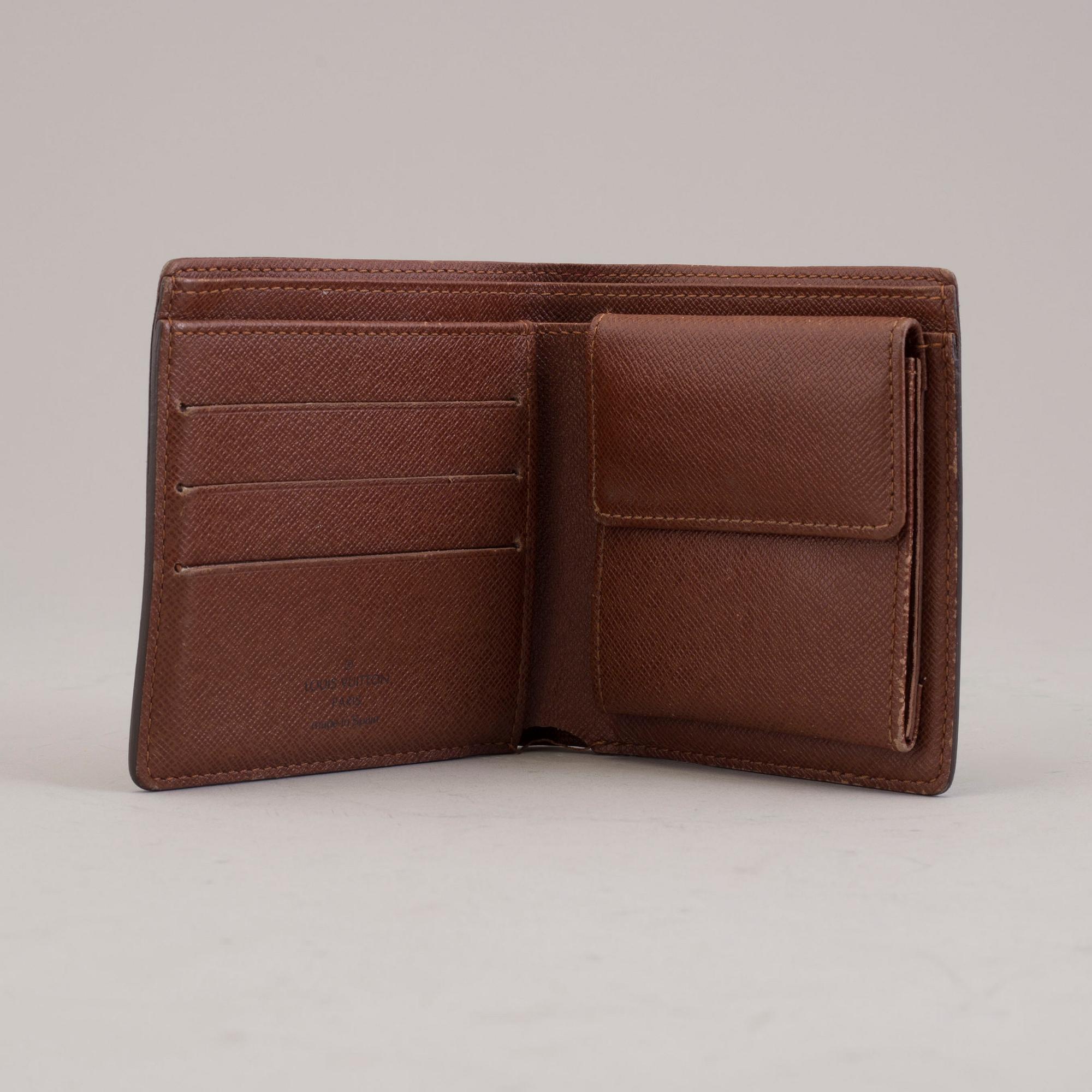 LOUIS VUITTON, a monogram canvas wallet.