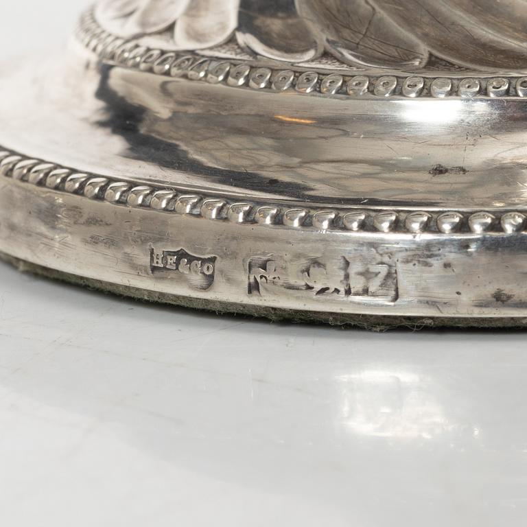 A pair of English silver candelabra, mark of Hawksworth, Eyre & Co Ltd, Sheffield 1892.