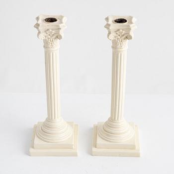 A pair of creamware candlesticks, around 1900.