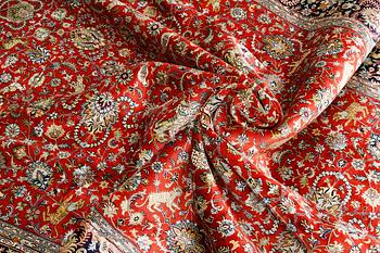 A pictoral orientalisk silk carpet, ca 284 x 180 cm.
