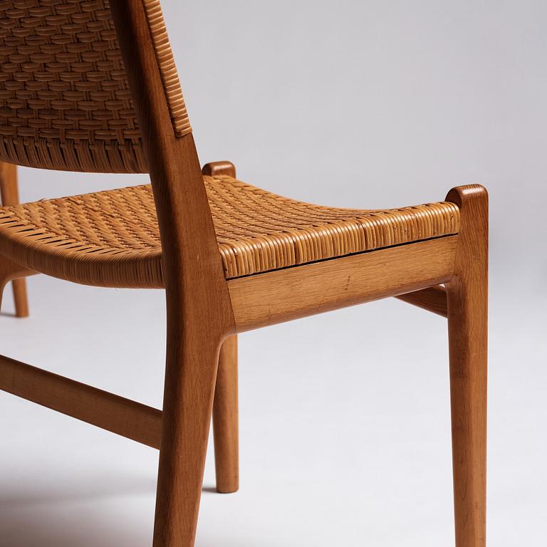 Hans J. Wegner, a set of 10 oak and rattan 'CH31' chairs, Carl Hansen & Son, Denmark 1950s.