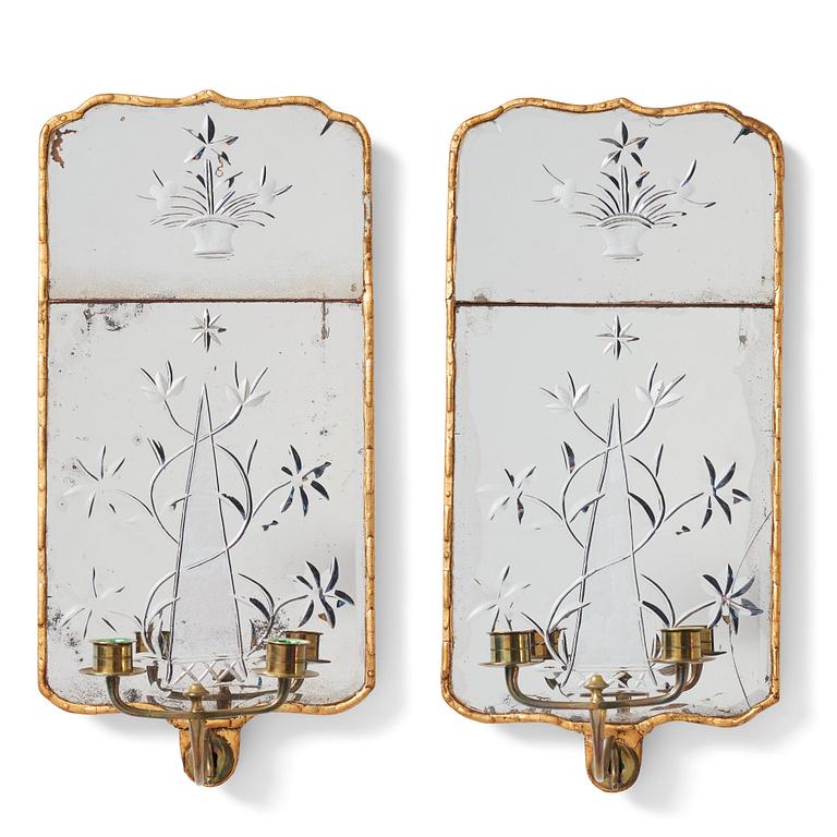 A pair of Rococo two-light girandole mirrors, by N. Sundström.