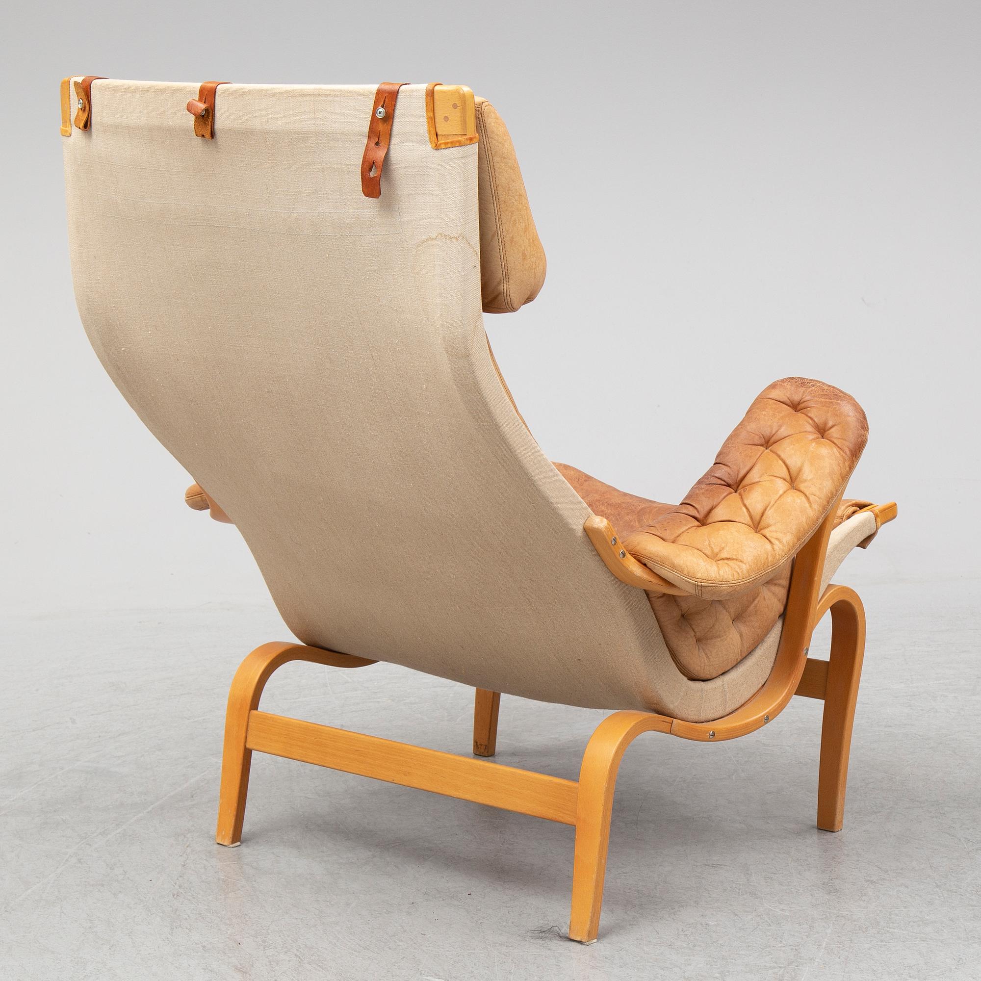 A 'Pernilla' armchair by Bruno Mathsson for dux.