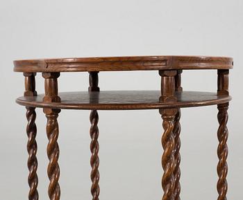 AN OAK TABLE FROM NORDISKA KOMPANIET, 1921.