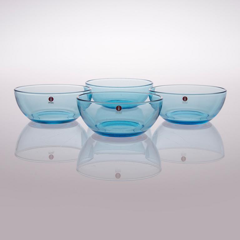 A set of 22 glass dessert bowls in three colours, Iittala, Finland, late 20th century.