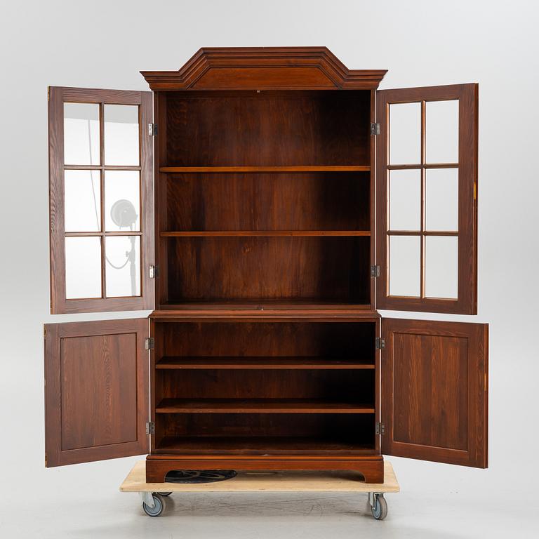 A vitrine cabinet from Åmells, dated 1974.