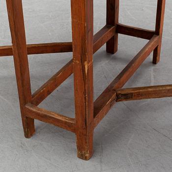 A pine gate leg table, 19th Century.