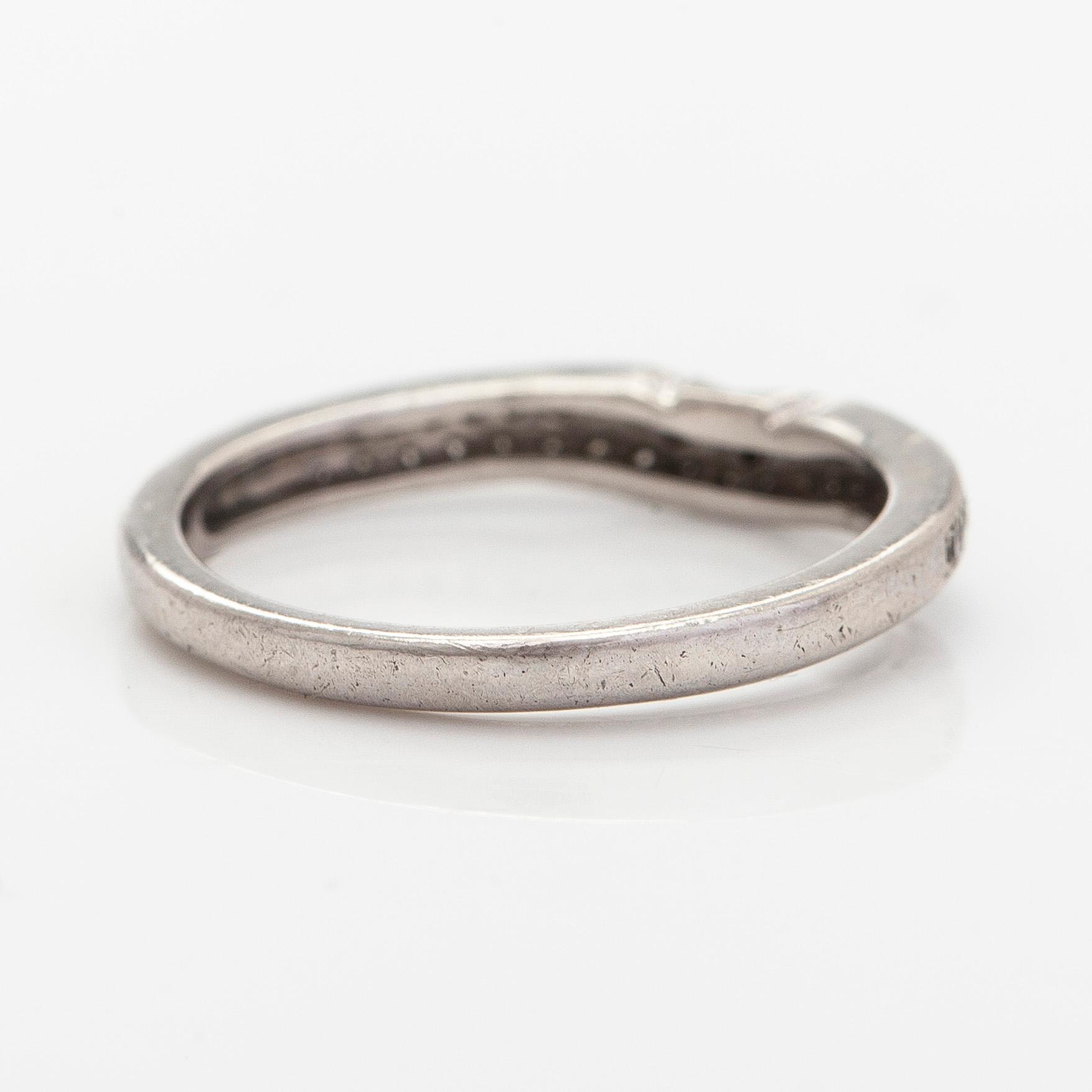 Ring, half eternity, platinum with diamonds.