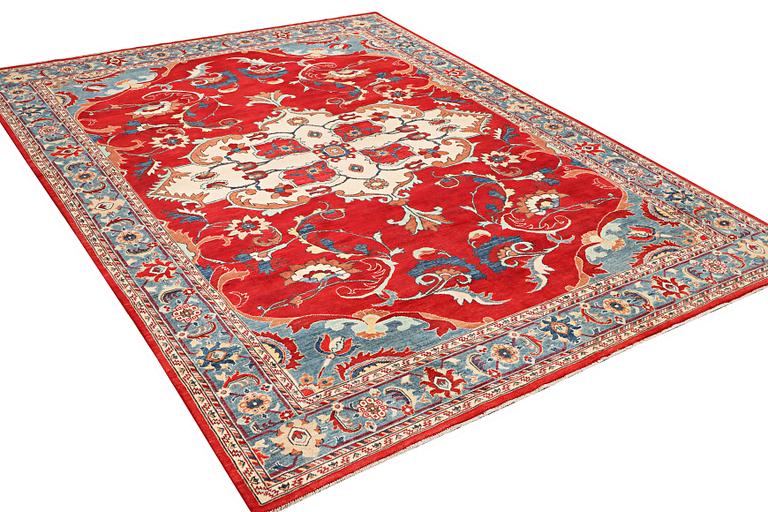 A Kazak carpet, c. 354 x 266 cm.