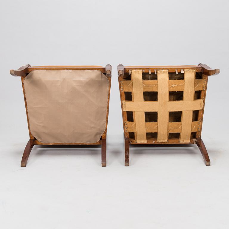 A pair of armchairs, possibly Boman, around 1900.