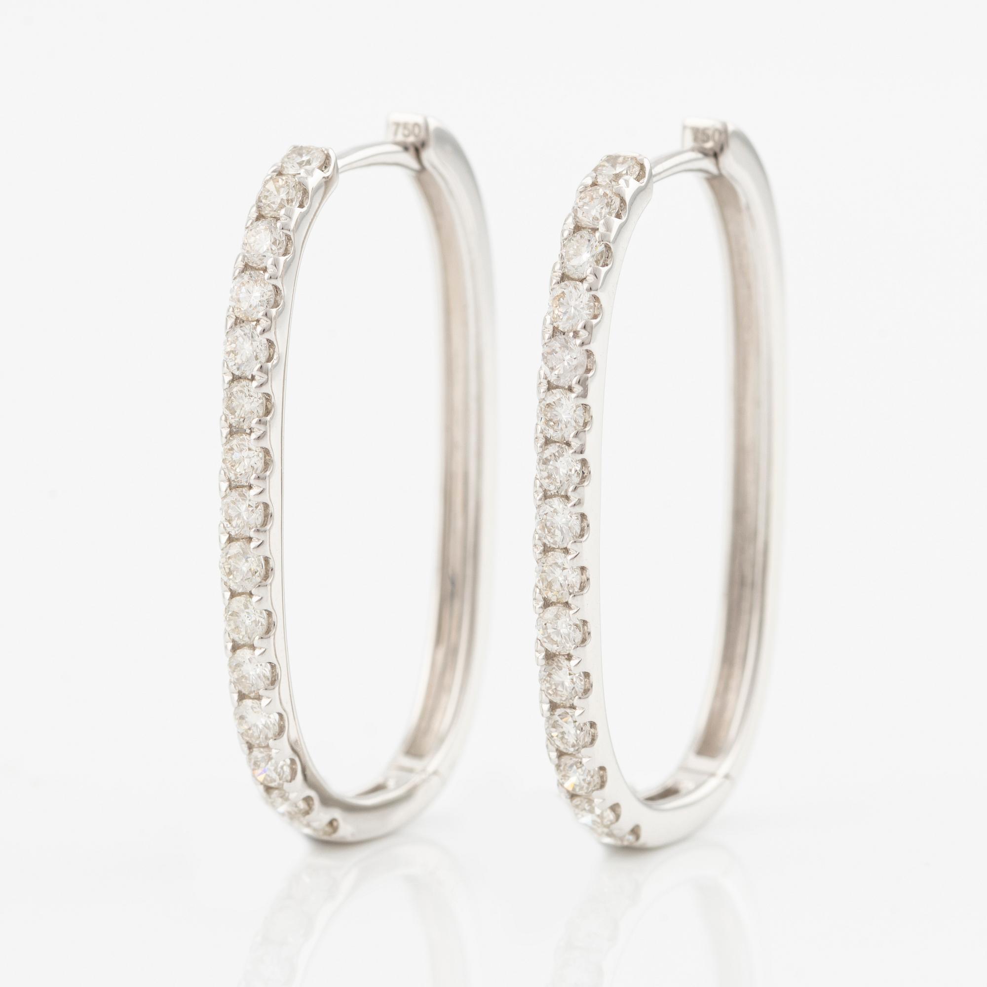 Earrings with brilliant-cut diamonds.