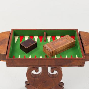 A Swedish Empire mahogany games' table attributed to J. Öman (master in Stockholm 1815-33).