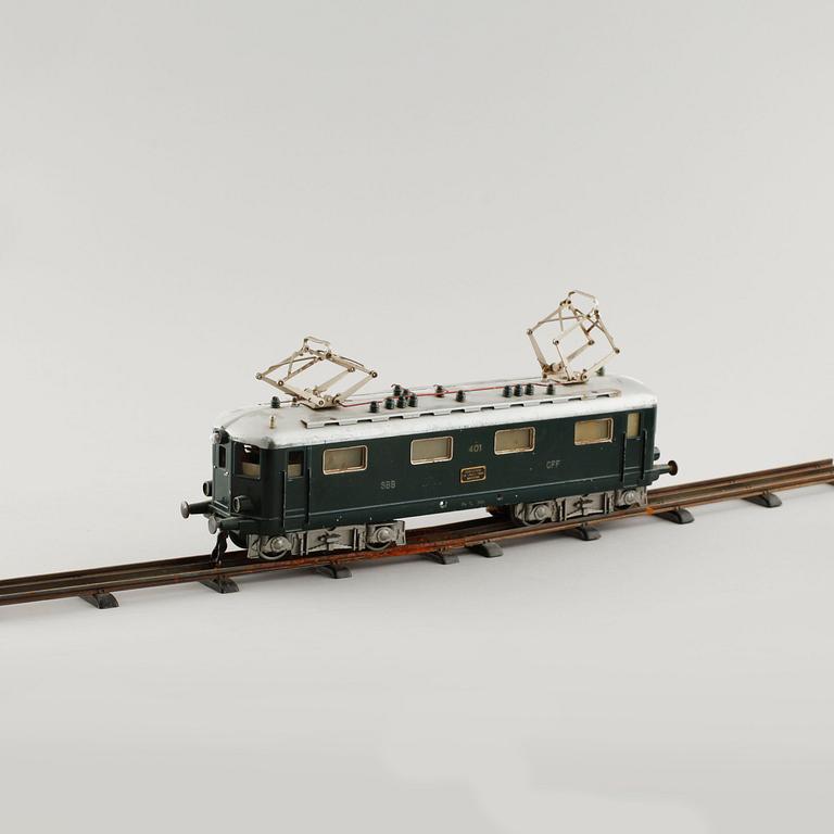 A 1940/50s model train set of 31 pcs in O-scale made by HAG, Switzerland.