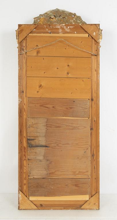 A rococo-style mirror and console table, around 1900.