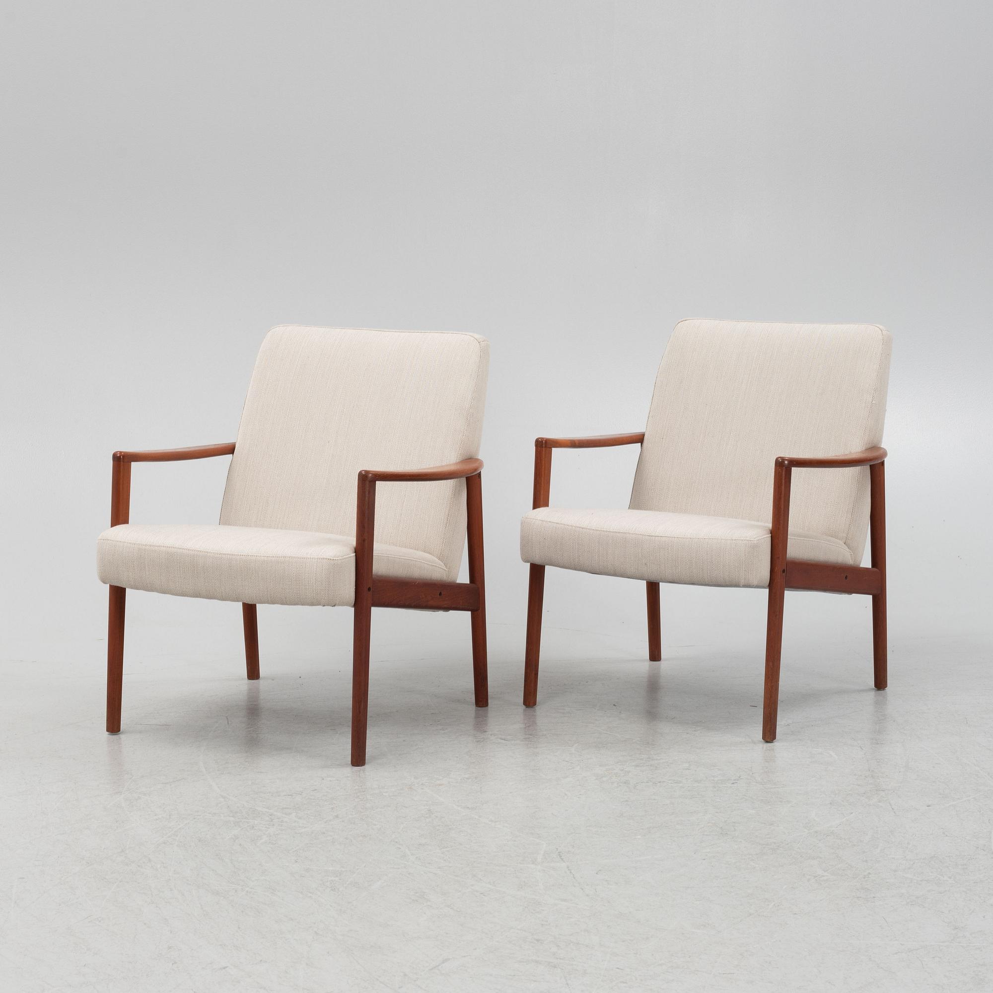 A pair of mid-century easy chairs.